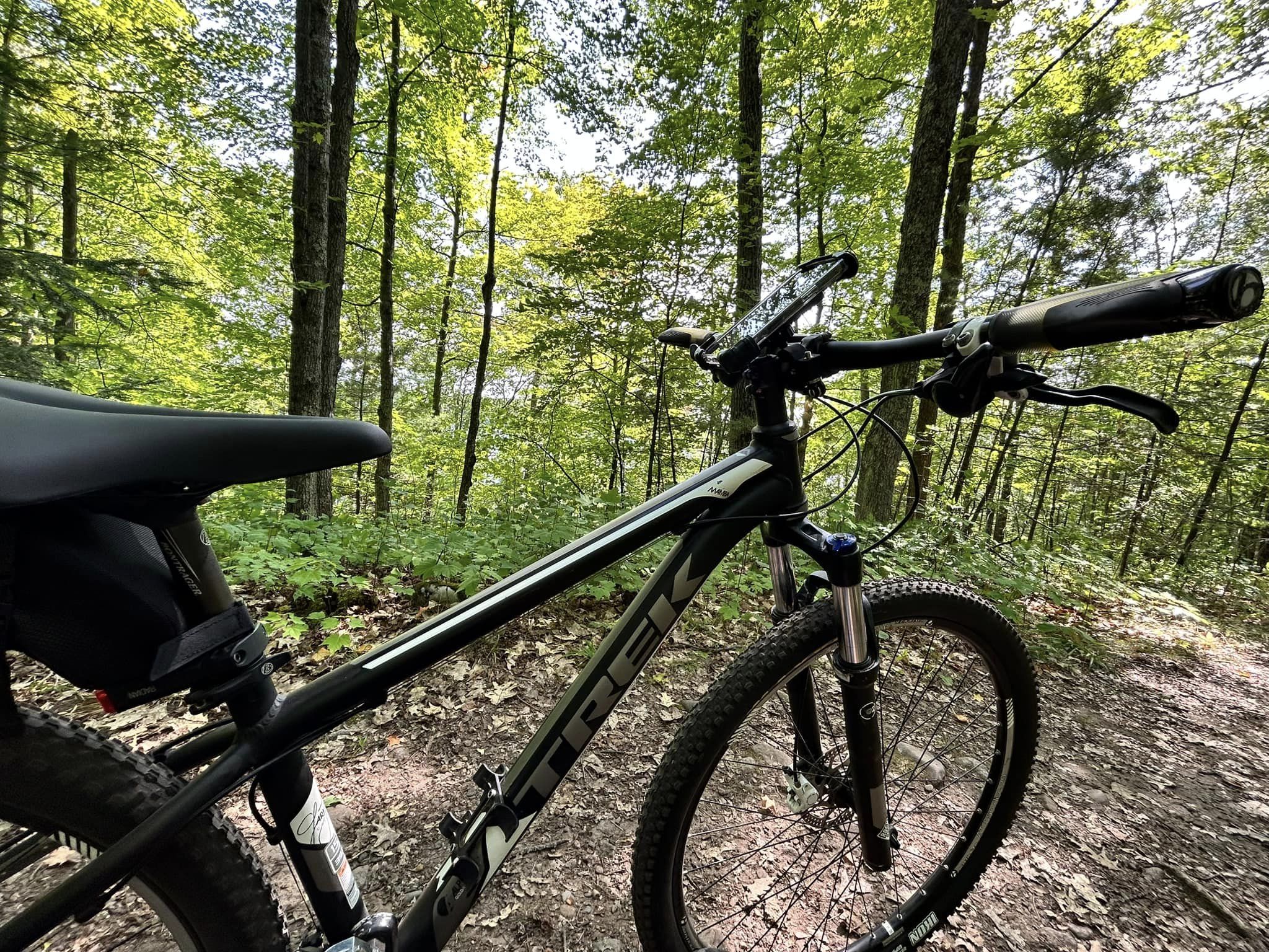 Featured image for “Exploring Nature’s Symphony: Mountain Biking the Raven Trail in Minocqua, Wisconsin”